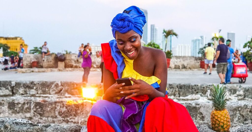 Woman dressed in colorful clothes in Colombia