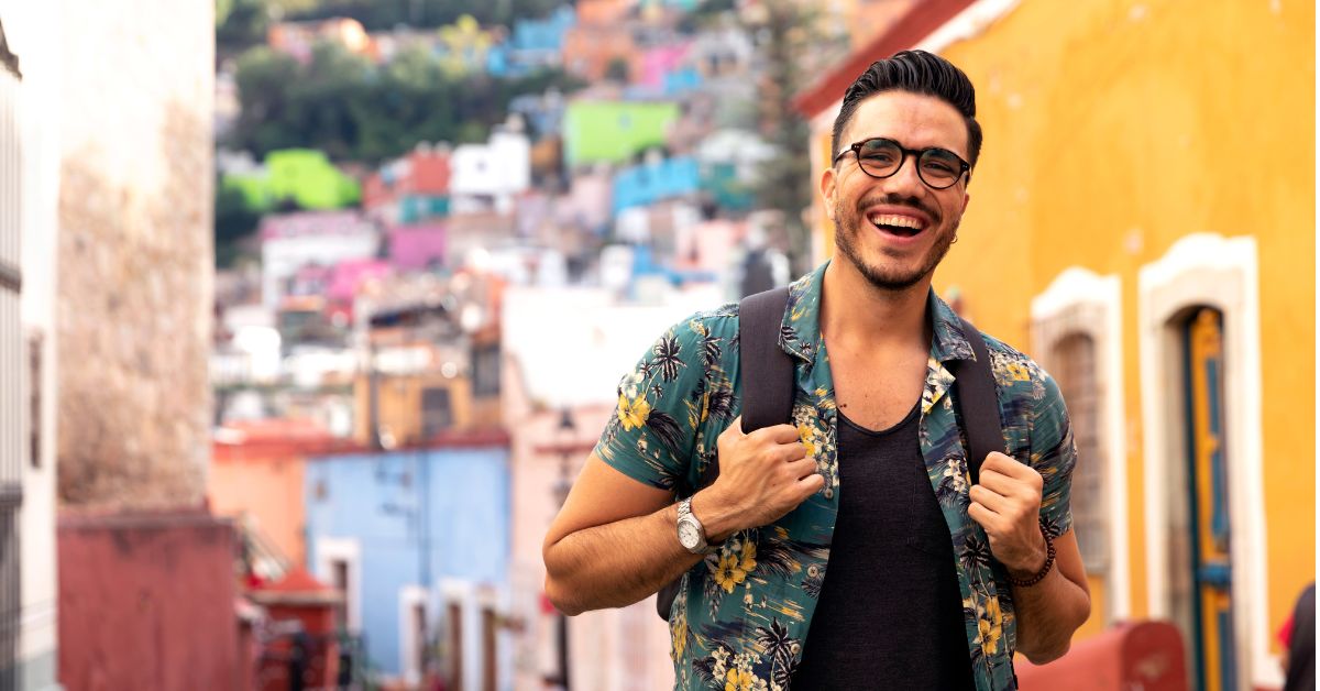 A digital nomad with an LLC smiles at the camera