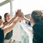 US expats high five.