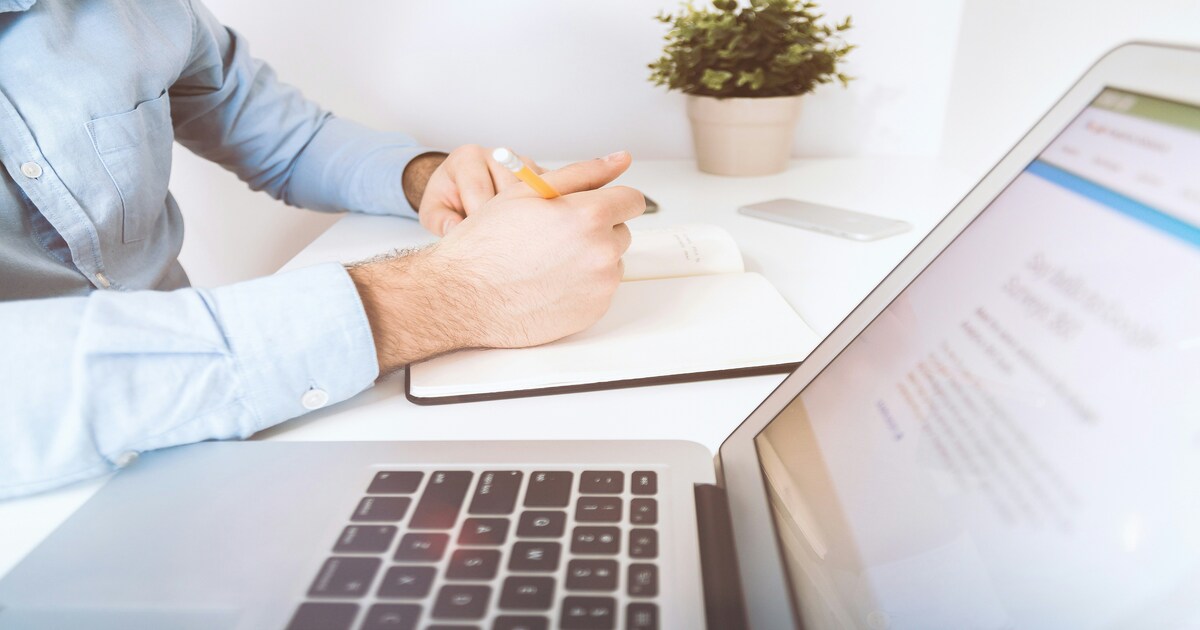 Expat business shareholder filing form 1120-s on her laptop