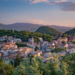 Peaceful town surrounded by forested hills, reflecting the slower pace of life enjoyed by Americans living in Bulgaria.