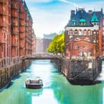 Sightseeing boat glides through Hamburg’s historic Speicherstadt, a popular destination that leads many travelers to ask: do US citizens need a visa for Germany?